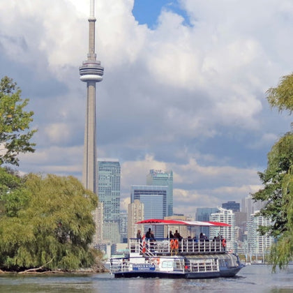 The Harbour Star Boat exiting the Toronto Islands with the Toronto Skyline in the background