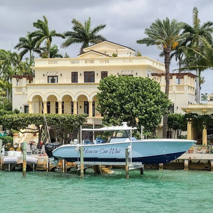 Celebrity home with their own boat 