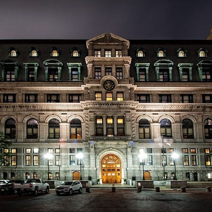 Nighttime photo of the historic John Adams Courthouse