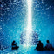 Three people sit on the floor in a dark space illuminated by cascading white lights against a blue background.