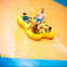 Four people riding down a water slide on a yellow inflatable raft.