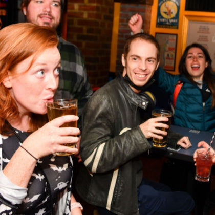 Tour guide and guests sharing drinks during the tour