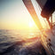 Sailboat sailing into the sunset