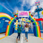 Two children walk towards a colorful amusement park ride entrance with rainbow decorations and a sign reading "Unikitty's Disco Drop."