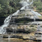 Walk on stepping stones at the bottom of the amazing Katoomba Cascades Waterfalls