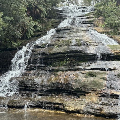 Walk on stepping stones at the bottom of the amazing Katoomba Cascades Waterfalls