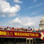 A double-decker sightseeing bus labeled "Big Bus Washington DC" near the US Capitol under a partly cloudy sky.