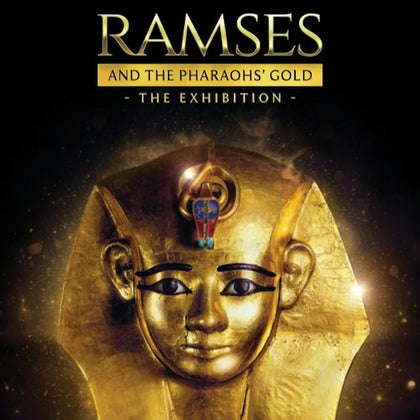 Golden mask of an Egyptian pharaoh with exhibition title 'Ramses and the Pharaohs' Gold' displayed above.