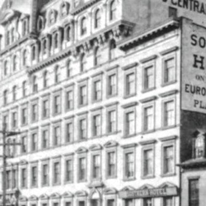 A vintage multi-story building with a sign reading 'Southern Hotel' and detailed architectural features.