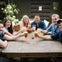 A group of guests enjoying a drink at a local pub