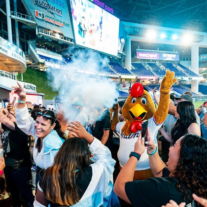 Mascot visits in the outfield Recess Lounge