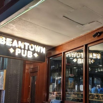 Nighttime entrance photo of the Beantown Pub