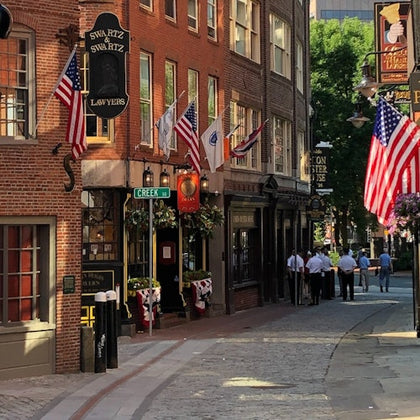 Venture down colonial-era lanes along beloved Tavern Alley in Boston's historic Blackstone Block