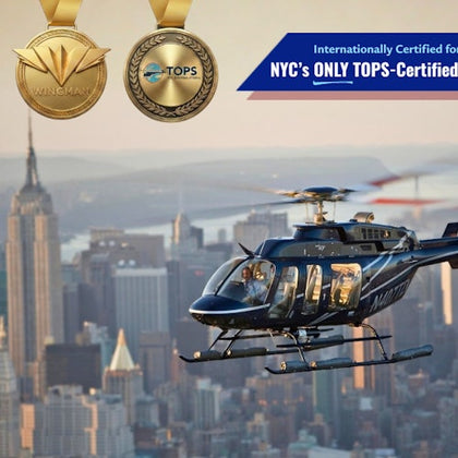 A helicopter flies over Manhattan with the Empire State Building in the background; text promotes NYC TOPS certification.