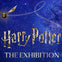 Golden snitch and text 'Harry Potter The Exhibition' on a starry blue background.