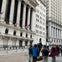 An engaging shot of our tour group captivated by the rich history of the New York Stock Exchange.
