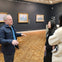 Guide discussing Monet's London paintings