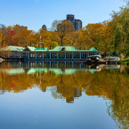 New York City Manhattan Central Park panorama in Autumn Lake.