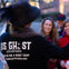 Tour guide making a tour group laugh while holding their EMF detectors, picking up on a paranormal activity