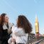 Friends enjoying their photoshoot in front of Big Ben