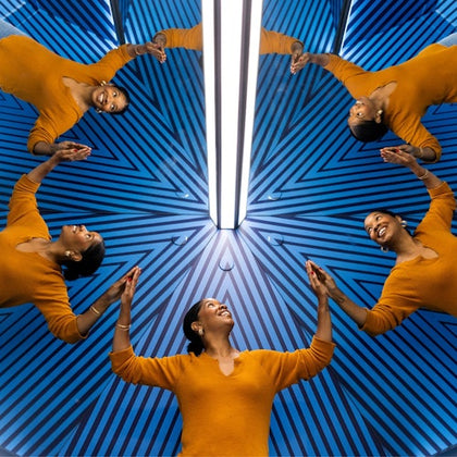 Woman at museum of illusions in Chicago