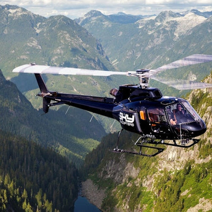 SKY Helicopters B2 AStar flying in the rugged backcountry of British Columbia. Population: 0