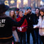 Tour guide entertaining guests as they hold EMF detectors used to pick up on ghost activity