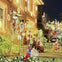 Holiday-decorated house with bright lights, snowflakes, and festive ornaments, including nutcracker figures and garlands.