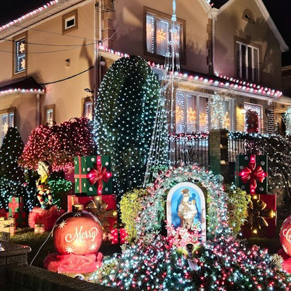A corner house features a saintly shrine