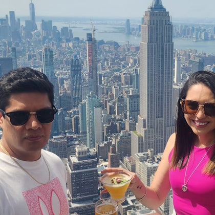 Guests in SUMMIT One Vanderbilt with view of Manhattan