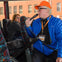 Tour Guide on Brooklyn, Bronx, Queens Bus Tour inside Bus