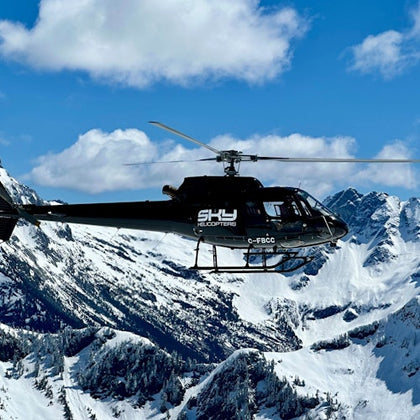Towering mountain peaks in the springtime in BC's remote wilderness. Population: 0
