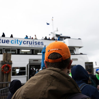 Guide in front of ferry.