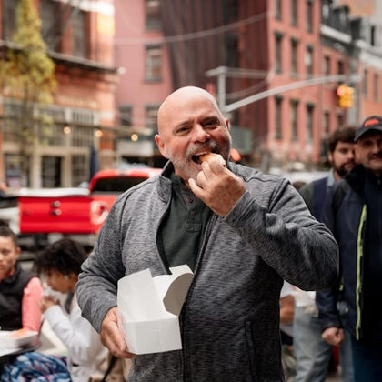 Trying delicious local cannoli in Little Italy.