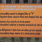 Sign explaining differences between crocodiles and alligators, including snout shape, habitat, and skin color.