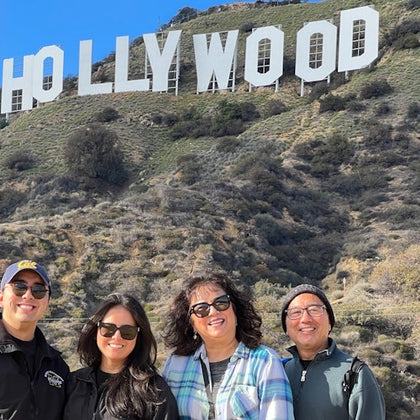 All Smiles at the Hollywood Sign!