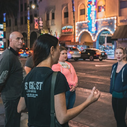 Tour guide sharing authentic ghost stories.