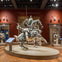 A museum exhibit displaying a horse and rider in full medieval armor on a pedestal, surrounded by arms and armor displays.