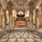 A grand crypt with stone columns, ornate flooring, and a central tomb with the inscription 'Horatio Viscount Nelson'.
