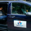 A guest in a See Sight Tours van.