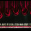 A line of performers dressed as toy soldiers in red uniforms and white hats stands under red stage curtains.