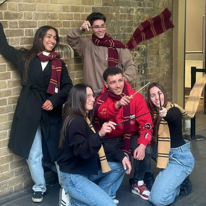 Family holding wands