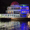 Celebrity home lit up at night