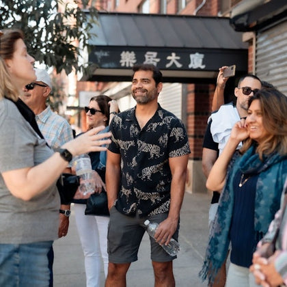 Tour Guide Ann exploring the streets of Chinatown