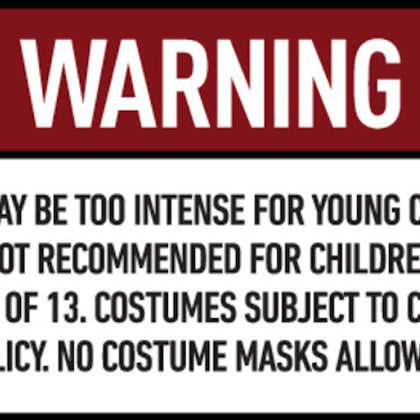 A warning sign stating that content may be intense for young children, not recommended for under 13, and costume rules apply.