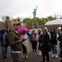 Guide with group in front of Statue of Liberty