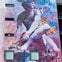 A colorful mural on a building featuring a large statue-like figure overlaid with vibrant graffiti art and patterns.