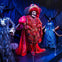 A display of elaborately designed costumes, including a red skeleton-themed outfit, set against a dark, dramatic backdrop.